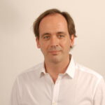 Ritratto di Andrea Chiaravalli, Customer Manager Transporeon Italia, intervista sull’applicazione del DL 73/2025 e sul Time Slot Management nella logistica italiana.