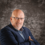 Ritratto di Gerry Daalhuisen, esperto Transporeon, intervista su ottimizzazione piazzali e gestione digitale degli slot di carico a livello europeo.